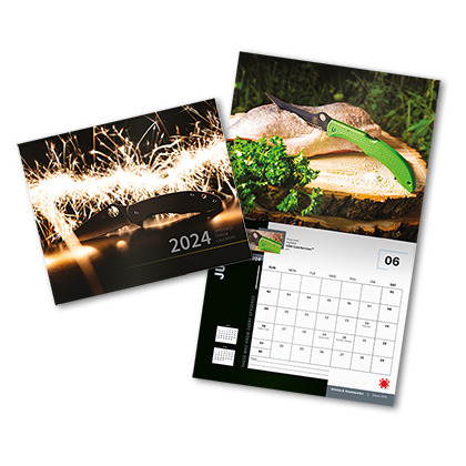 The 2024 Spyderco Wall Calendar shown open and closed