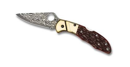 The Delica  Damascus Sprint Run  Knife shown opened and closed.