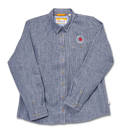 The Orvis  Women  039 s Tech Chambray Blue Work Shirt Long Sleeve Knife shown opened and closed.